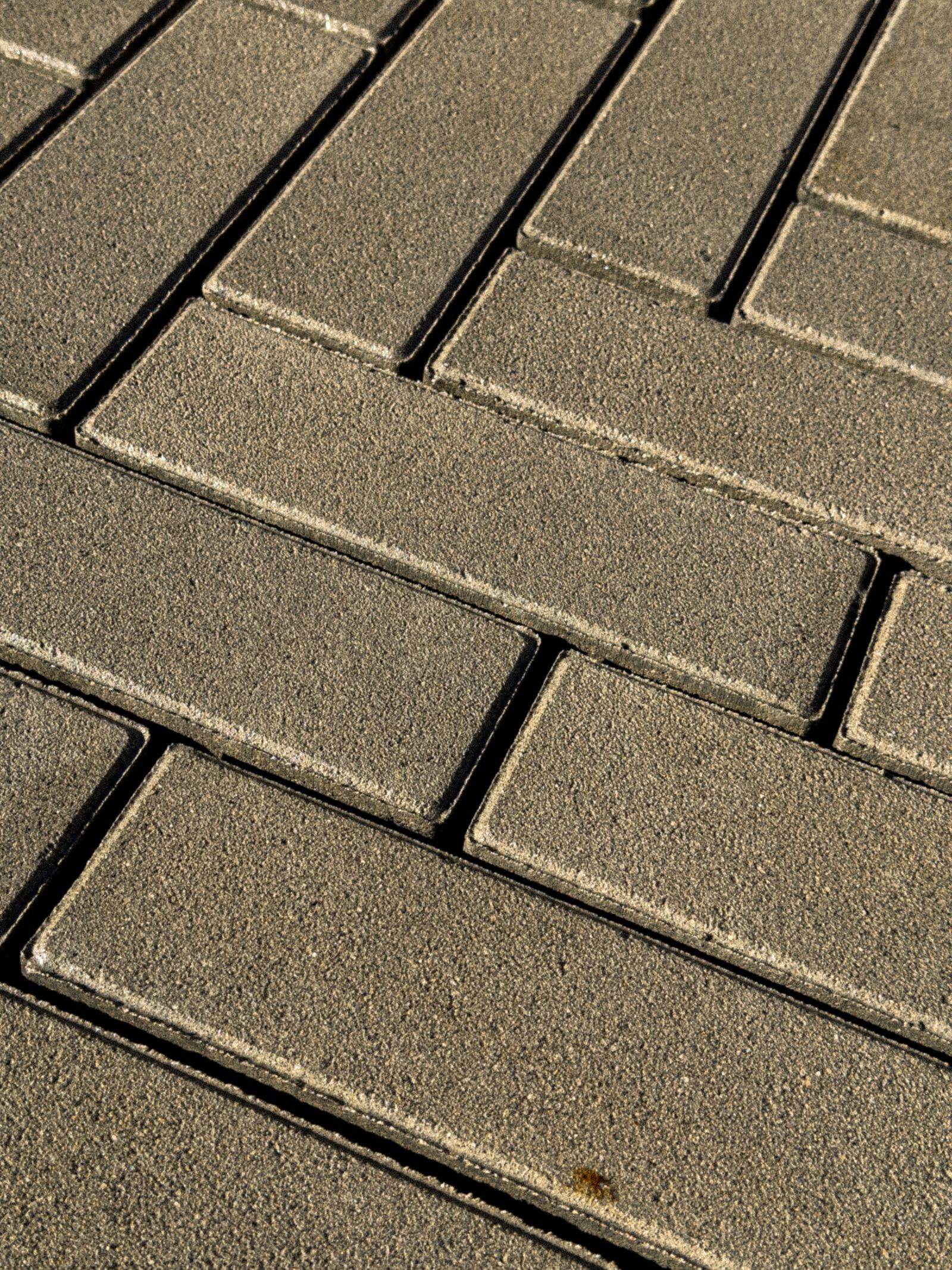 Herringbone pattern driveway pavers installed in Los Angeles